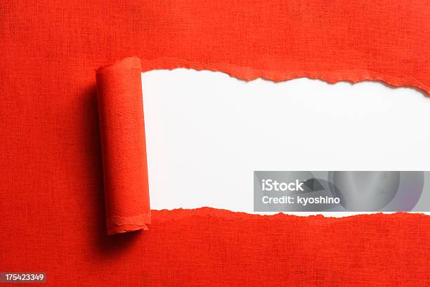 Isolated Shot Of Torn Red Paper On White Background Stock Photo - Download Image Now