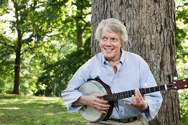 istock Senior Man Playing Banjo 175423411