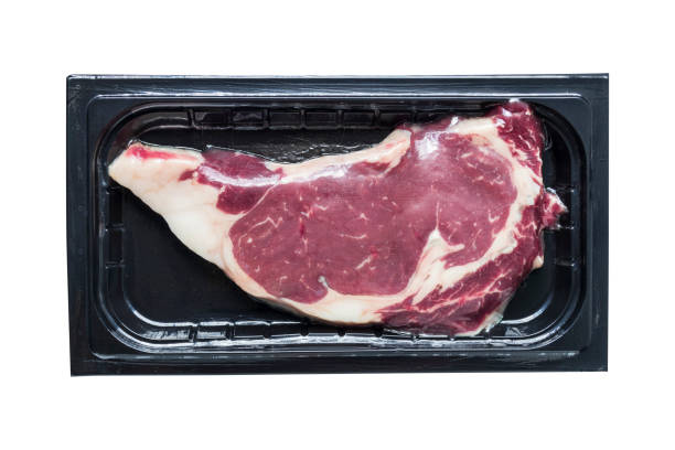 istock Top view of Raw Steak is Packed in a Plastic Container and Vacuum Sealed Isolated On White Background 1754235045