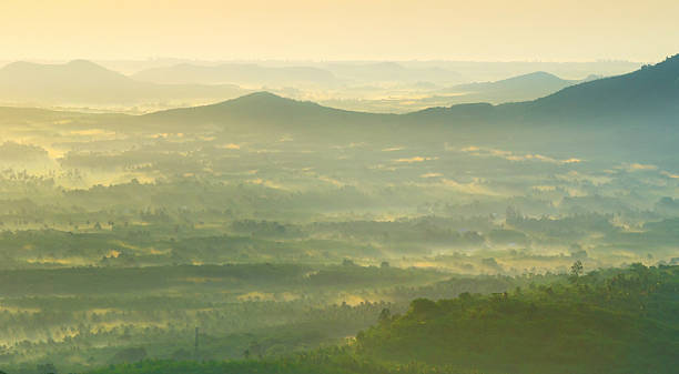 istock Beautiful sunrise at misty morning mountains . 175423831