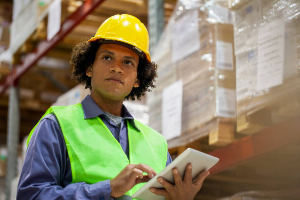 istock African American storage packer checking packages inside warehouse facility 1754241163