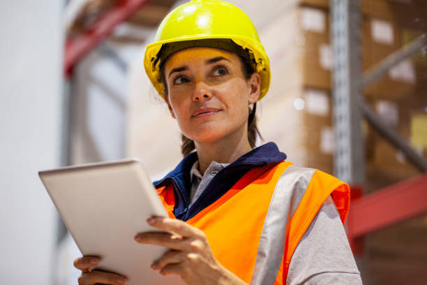 istock Portrait of female storage packer checking inventory in warehouse facility 1754243780