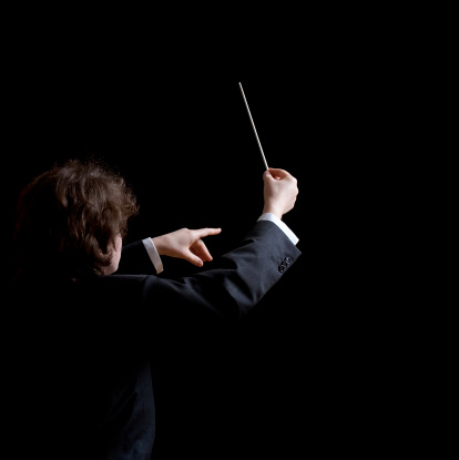 Conductor's hands with a baton