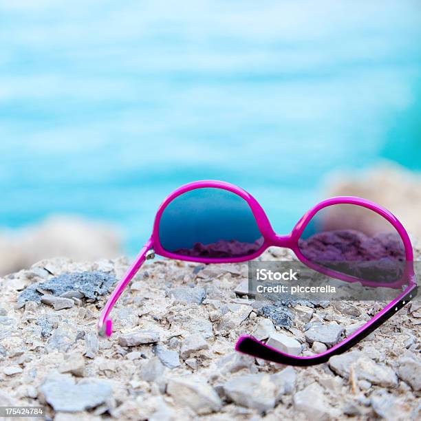 Sunglasses On The Seaside Stock Photo - Download Image Now - Beach, Concepts, Copy Space