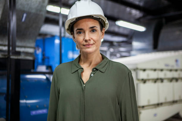 istock Female warehouse supervisor standing inside industrial facility 1754249188