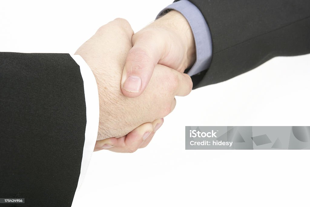 Shake on it Men shaking hands Agreement Stock Photo