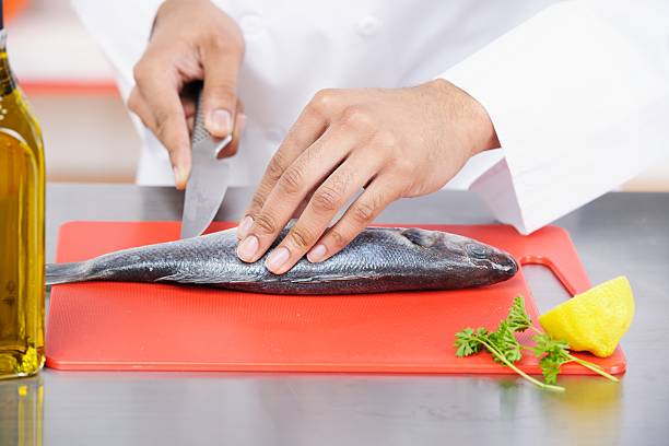Biracial Chef Peparing Fish