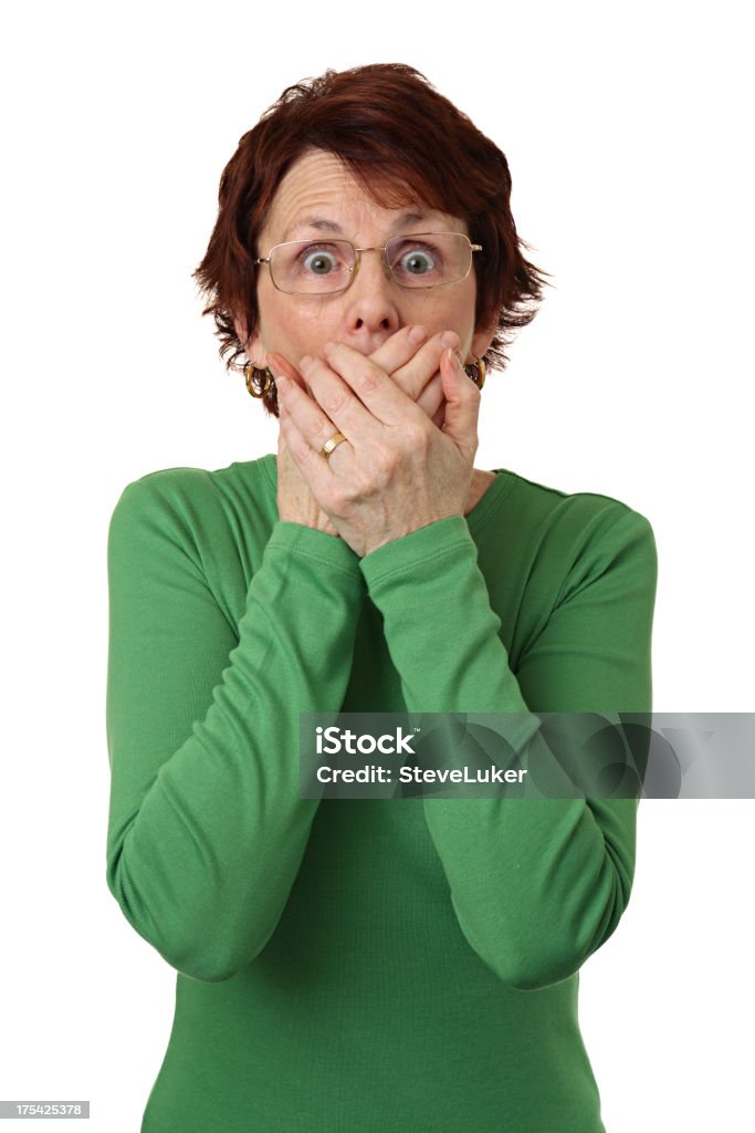 Frightened Woman with a scared or shocked expression. 50-59 Years Stock Photo