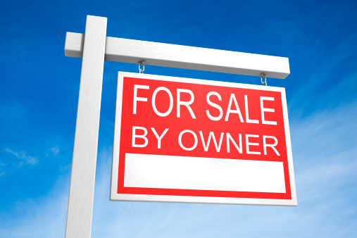 For sale by owner sign on a blue sky background.Could be useful in a real estate composition.This is a detailed 3d rendering.