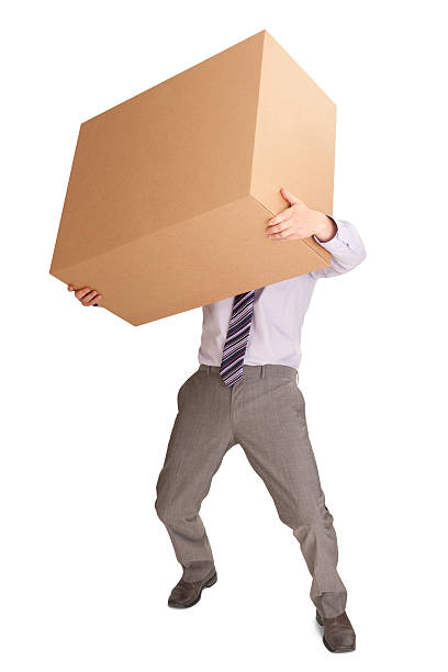 istock Person struggling with large cardboard box 175426457