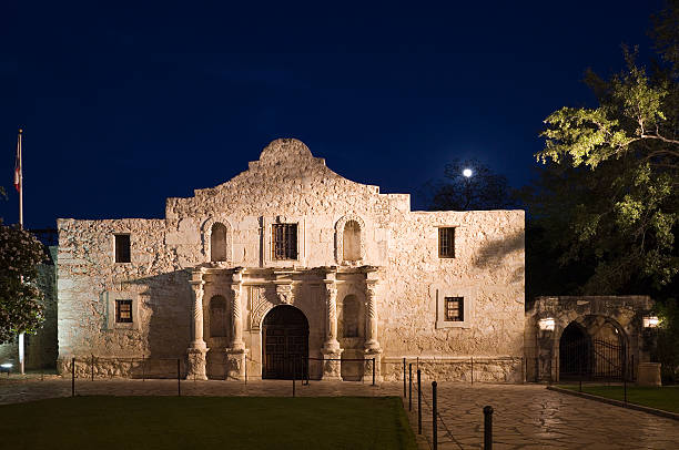 istock The Alamo, San Antonio Texas with full moon through trees 175427304