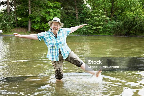Senior Woman Summer Fun In Pond Stock Photo - Download Image Now - Senior Women, Full Length, Overweight