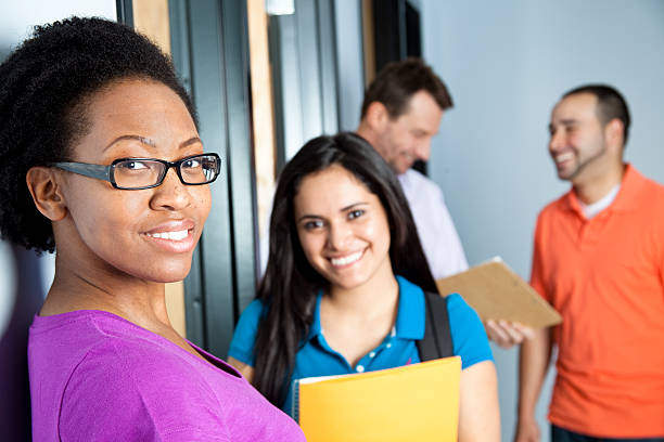 istock Happy Smiling student in the hall 175427368