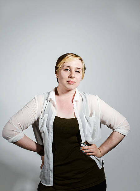istock Attractive Young Woman Looking At The Camera 175427692