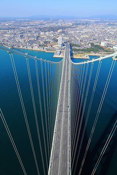 топ из akashi kaikyo мост - kobe bridge japan suspension bridge стоковые фото и изображения