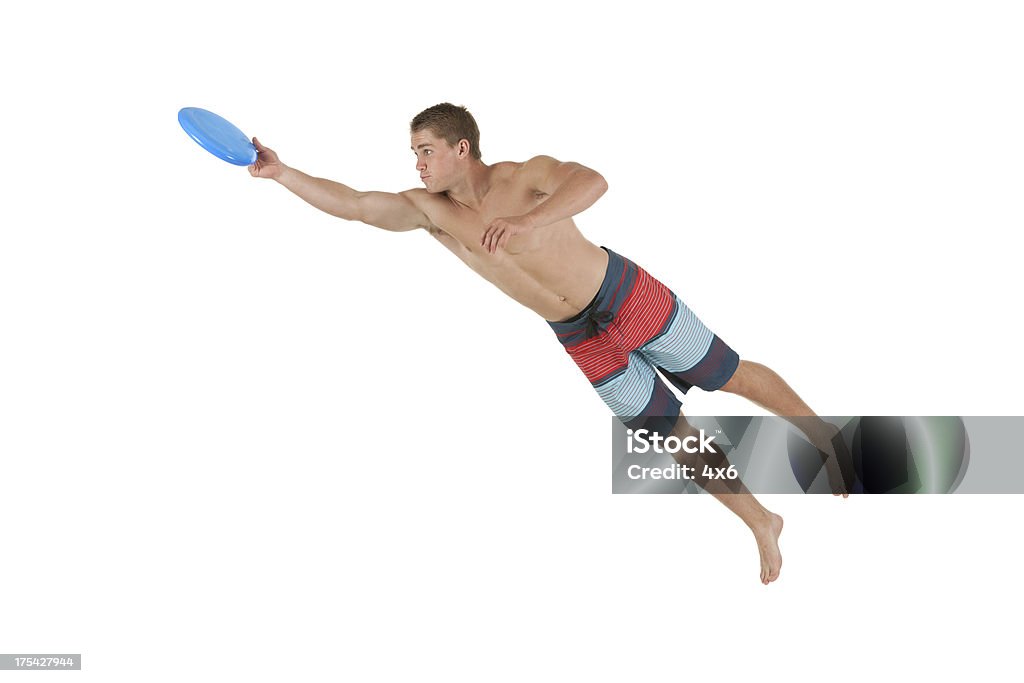 Sportsman jouant avec un frisbee - Photo de 18-19 ans libre de droits