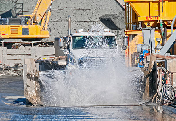 Water Truck spray to ground for protect occur dust at pond occur from excavation of the surface ground for Sale in Pathum Thani at Thailand.
