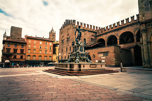 Piazza del Nettuno in Bologna, Italy Landmark Piazza del Nettuno in Bologna with the statue and the fountain emilia romagna photos stock pictures, royalty-free photos & images