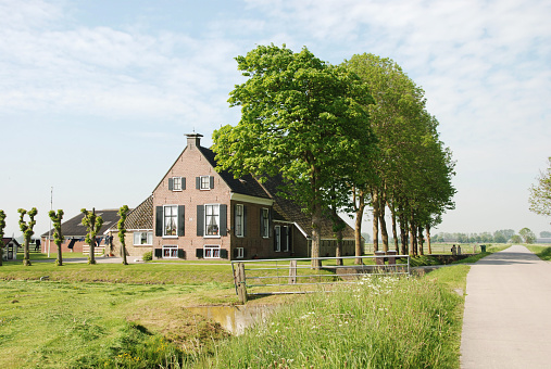 This is a typical  farmhouse that is standing in Friesland.