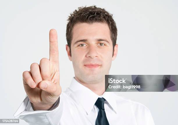 Businessman Giving Hand Symbol Stock Photo - Download Image Now - Number 1, One Person, Showing
