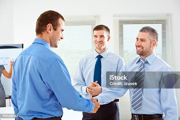 Business Handshake Stockfoto und mehr Bilder von Arbeitskollege - Arbeitskollege, Grüßen, Weiß