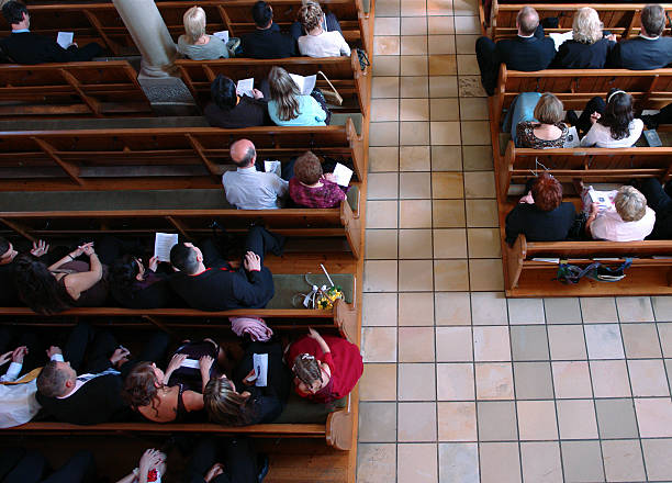congregation at church praying - kyrka bildbanksfoton och bilder