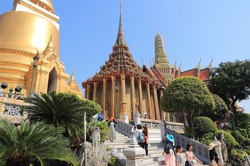 People visit famous Grand Palace in Bangkok. The palace has been the residence of Thai king since 1782.