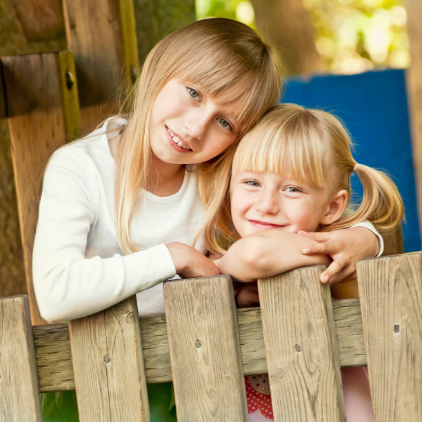istock Girls (sisters) playing at the modern playground - II 175429072