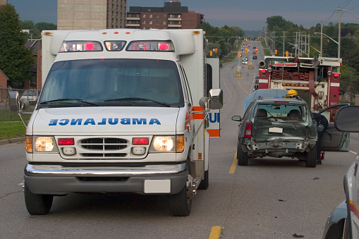 Rear ended car at accident scene with EMS Ambulance and Fire truck.There's more accident scenes in my portfolio.