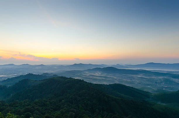 istock Beautiful sunrise at misty morning mountains . 175429176
