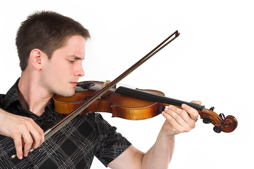 Young attractive man playing violin isolated on white