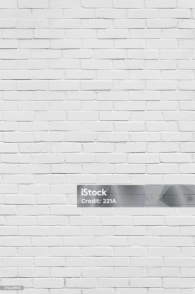 Справочная информация: Кирпичная стена окрашенный белый (вертикально) - Стоковые фото Кирпичная стена роялти-фри
