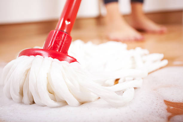 istock Woman mopping a wooden floor 175429938