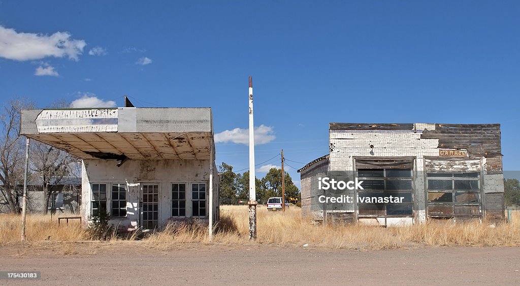 Abandoned Gas Station and Garage in Ghost Town, New Mexico Abandoned gas station and a garage in ghost town of New Mexico Ghost Town Stock Photo