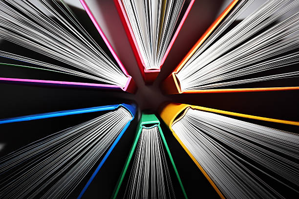 Explosion of Knowledge Fanned out colorful books forming an abstract pattern of explosion. education concept stock pictures, royalty-free photos & images