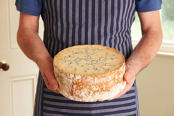 istock Grocer Holding Shropshire Blue Cheese 175430776
