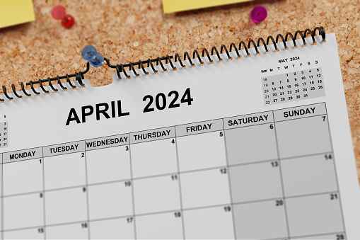 April 2024 Calendar on a cork noticeboard