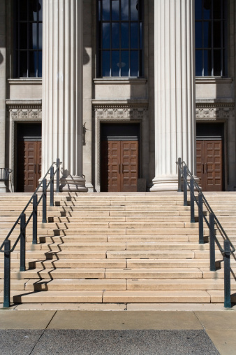 The front steps of Utah State Capitol Building. The front steps of Utah State Capitol Building with doors and huge columns at the top. View of the entryway to the iconic building in Salt Lake City, Utah.