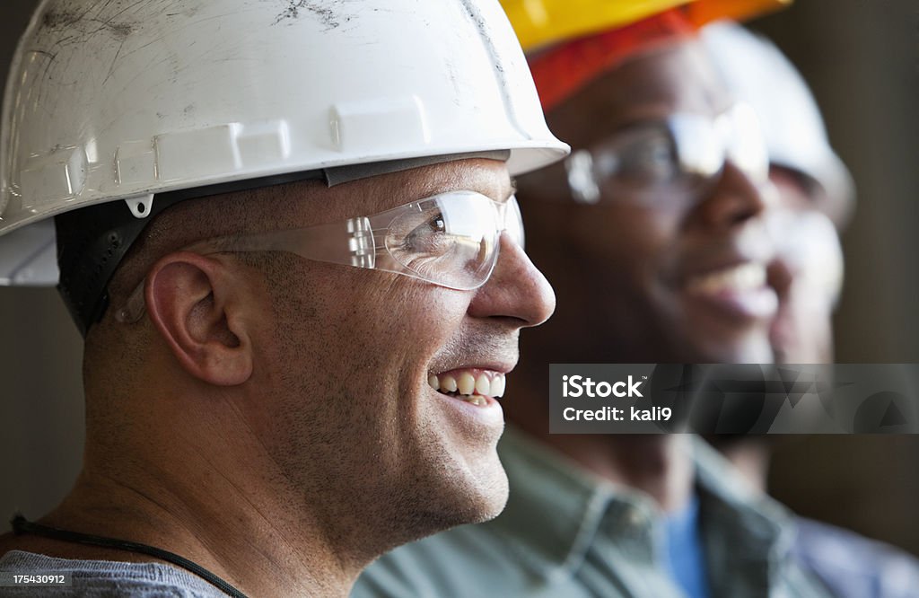 Nahaufnahme Gruppe von Bauarbeitern - Lizenzfrei Bauarbeiter Stock-Foto