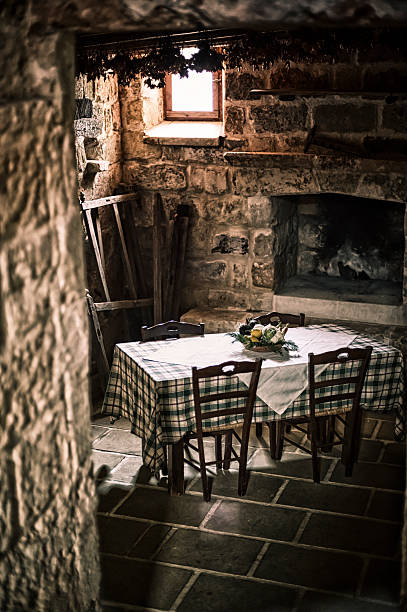 istock Table and chairs in a rustic italian farmhouse, Apulia 175431359