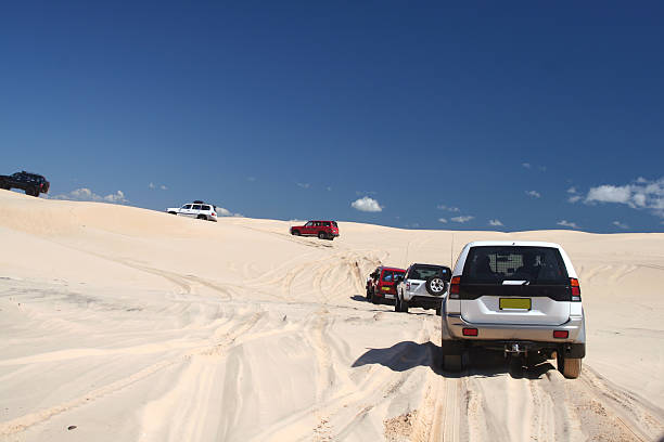Tackling the dunes stock photo