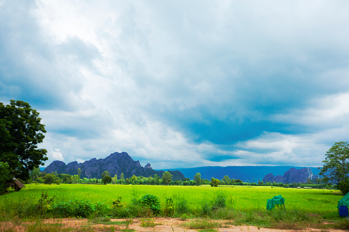 Dramatic tropical sky over  fields and landscape in Phitsanulok province  around village Parangmee near Noen Maprang in Phitsanulok province