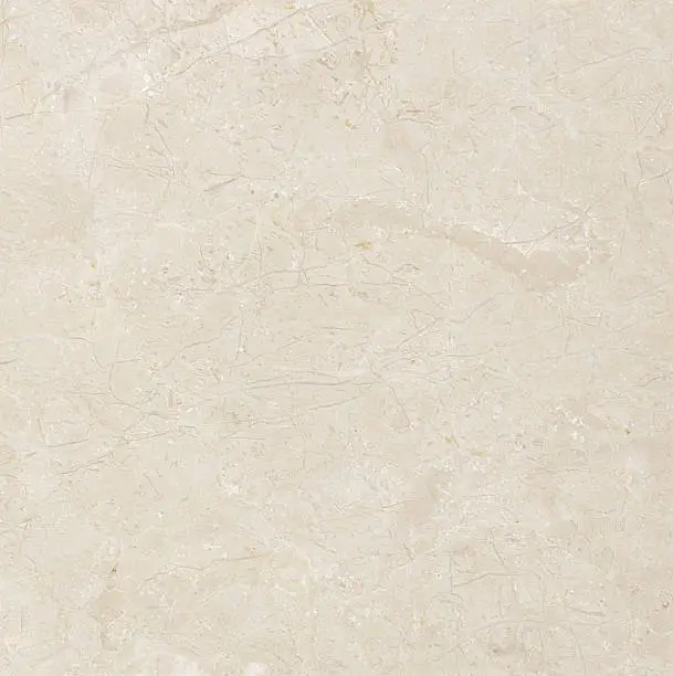 Photo of An abstract background made of a beige marble