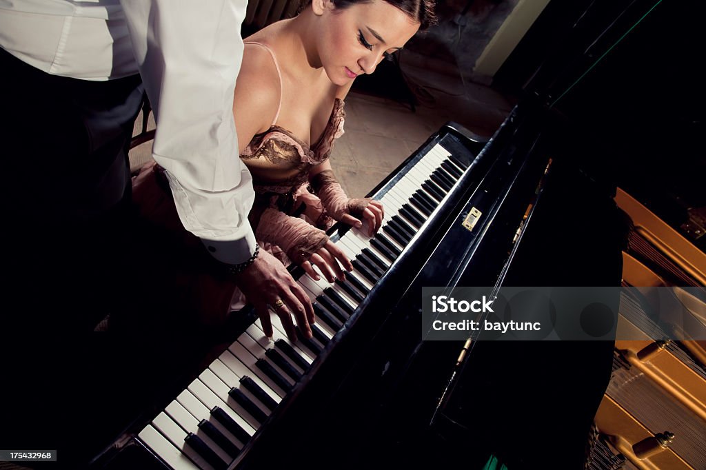 Piano Lessons piano lessons Adult Stock Photo