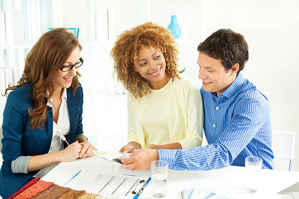 istock Couple Meeting with Interior Designer 175433312