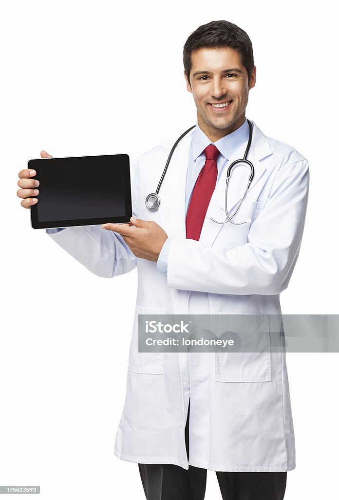Male Doctor Holding Digital Tablet - Isolated Portrait of a young male doctor in lab coat holding digital tablet. Vertical shot. Isolated on white. Adult Stock Photo