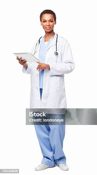 African American Female Doctor Using A Digital Tablet Isolated Stock Photo - Download Image Now