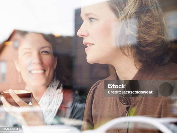 Friends Chatting In A Coffee Shop Stock Photo - Download Image Now - 30-34 Years, 30-39 Years, Adult