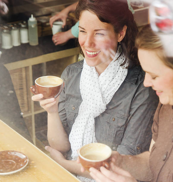 istock Friends chatting in a coffee shop 175433959