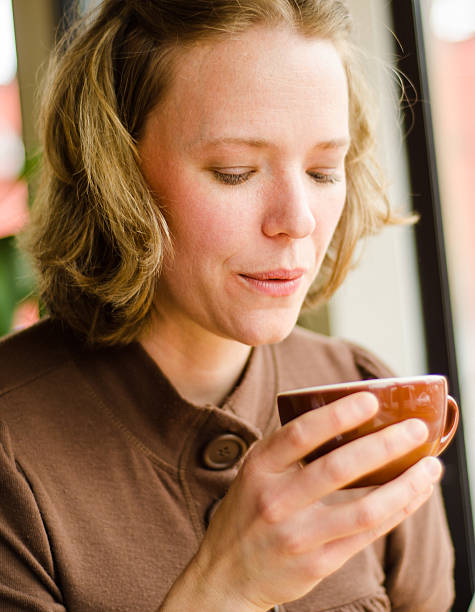 istock Woman cooling her coffee 175434019